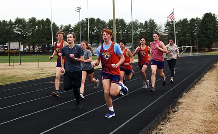 Cannon Crompton/sports@cherokeescout.com The Tri-County track team works on their 200-meter run during practice last week.