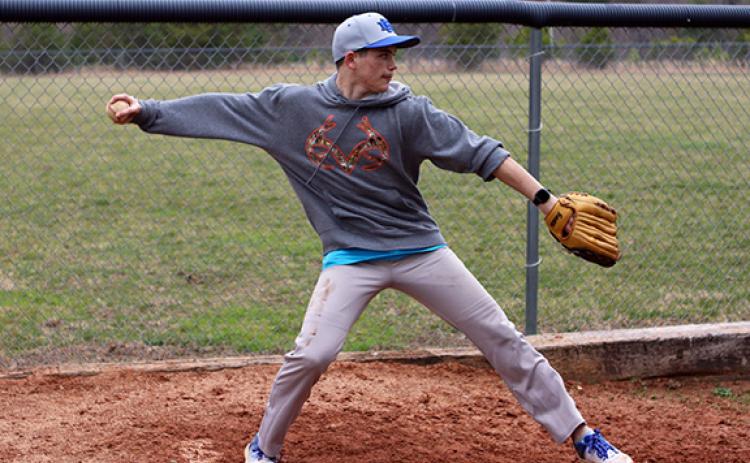Cannon Crompton/sports@cherokeescout.com Freshman Nickolas Sorbera works on pitching at practice on March 5.