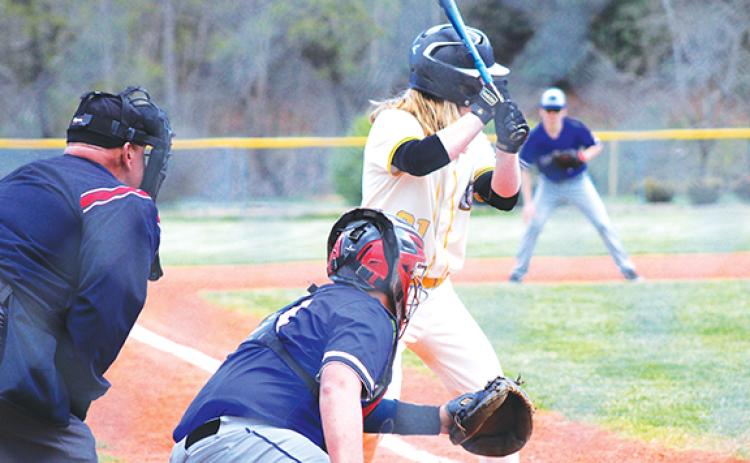 J.R. Carroll/Staff Correspondent Hiwassee Dam’s Trenten Beavers catches as Murphy’s Tommy Crapse hits on April 2.
