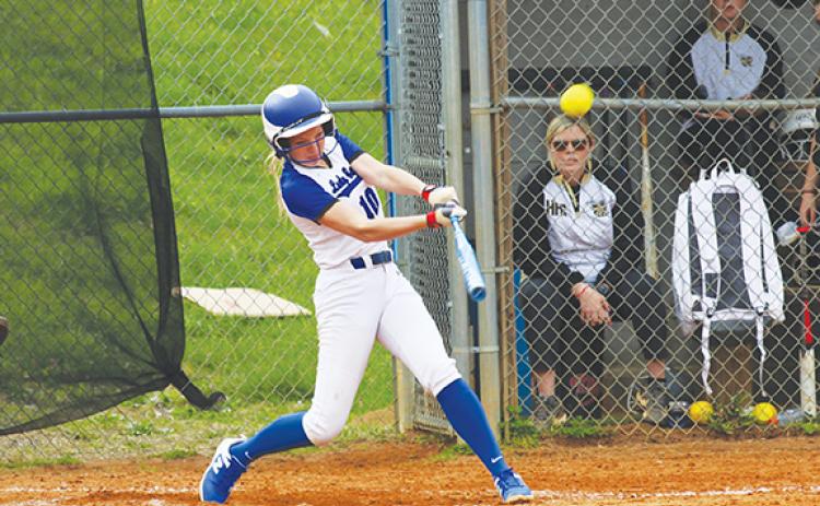 Cannon Crompton/sports@cherokeescout.com Katie McNabb of Hiwassee Dam follows through with her home-run swing against Hayesville on March 27.