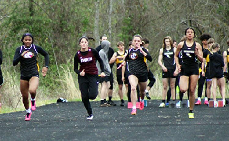 J.R. Carroll/Staff Correspondent Murphy runners (from left) Patience Garrett, Cayla Greer and Rylee Tabor competing in the 100-meter dash on April 3.