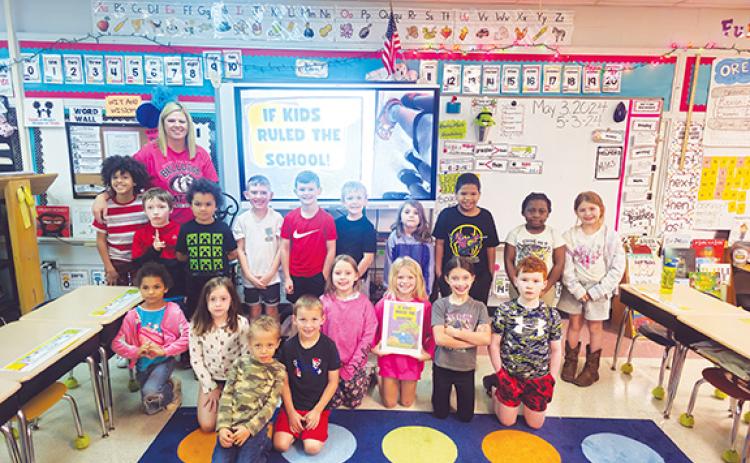 Nicole Wright/Staff Correspondent Teacher Holly Stonecypher’s first-grade class at Murphy Elementary School has a pretty good idea of what would happen If Kids Ruled the School! So they wrote a book about it.