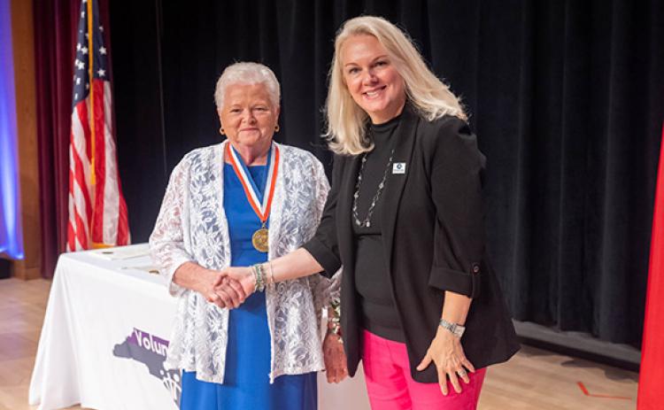 Marcil Hurt (center) was awarded the 2024 Governor’s Medallion Award for Volunteer Service at a ceremony held on May 6 at the N.C. Museum of History in Raleigh.